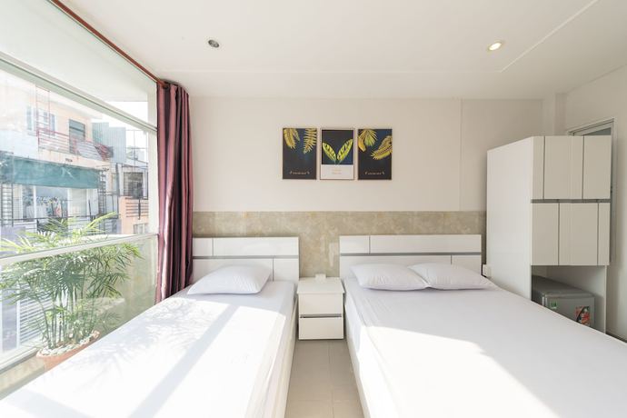 Imagen de la habitación del Hotel Saigon Cozy. Foto 11