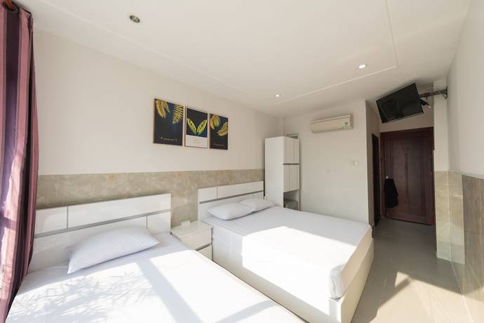 Imagen de la habitación del Hotel Saigon Cozy. Foto 13