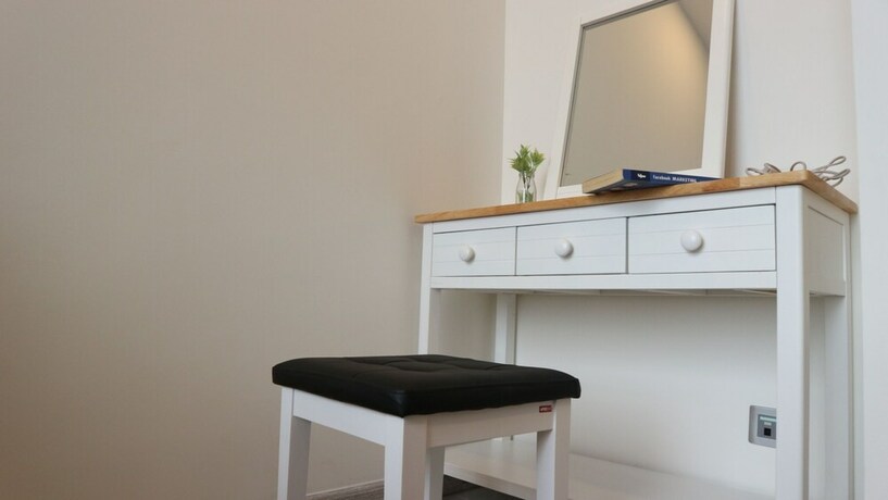 Imagen de la habitación del Hotel Saigon House Vinhomes Golden River. Foto 19