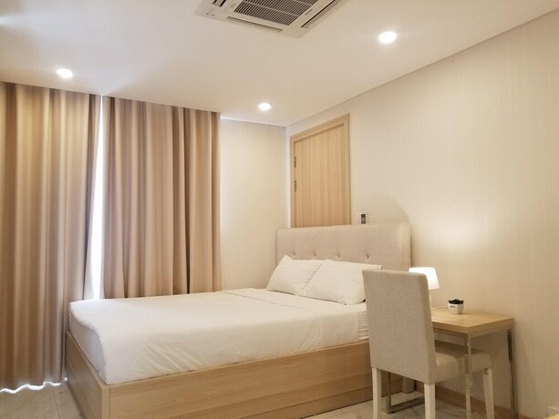 Imagen de la habitación del Hotel Saigon Paramount. Foto 22