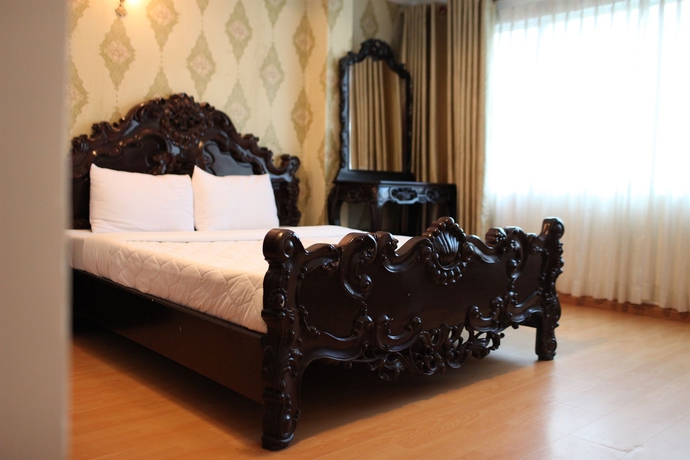 Imagen de la habitación del Hotel Saigon Pink 2. Foto 4