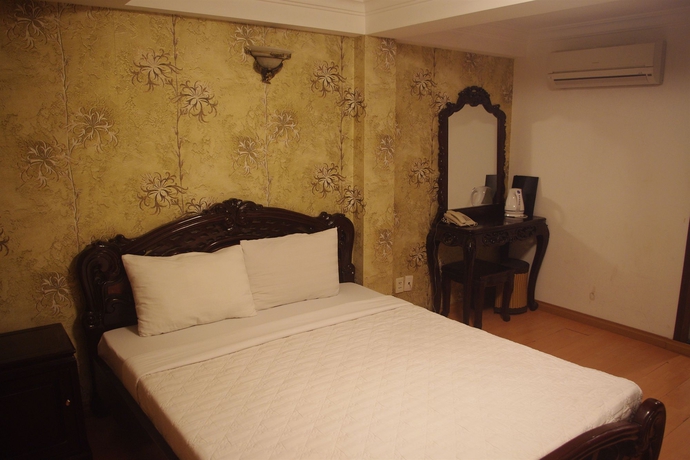 Imagen de la habitación del Hotel Saigon Pink 2. Foto 12