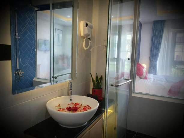 Imagen de la habitación del Hotel Saigon Sweet Hotel. Foto 13