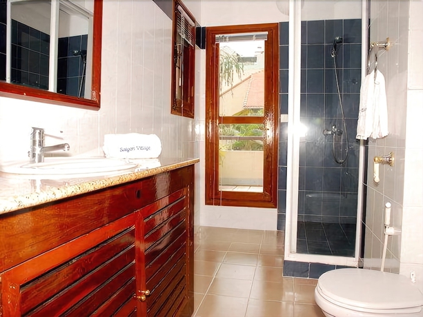 Imagen de la habitación del Hotel Saigon Village. Foto 15