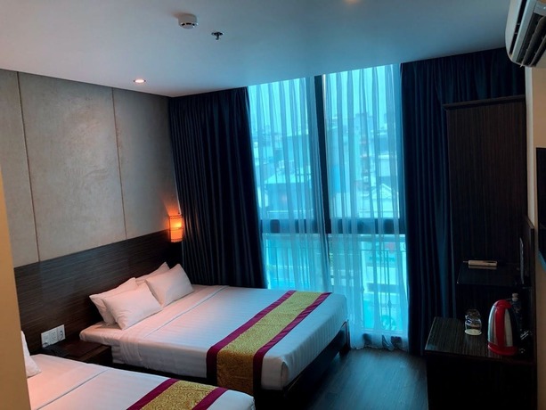 Imagen de la habitación del Hotel Saigonciti. Foto 8