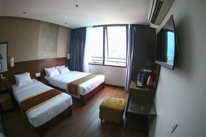 Imagen de la habitación del Hotel Saigonciti. Foto 13