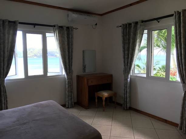 Imagen de la habitación del Hotel Sailfish Beach Villas. Foto 8