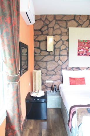 Imagen de la habitación del Hotel Sainamtok Resort. Foto 7
