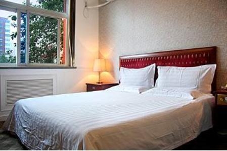 Imagen de la habitación del Hotel Saint Angel Hotel - Beijing. Foto 3