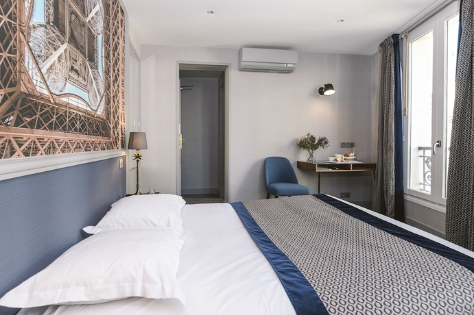 Imagen de la habitación del Hotel Saint Christophe, París. Foto 6