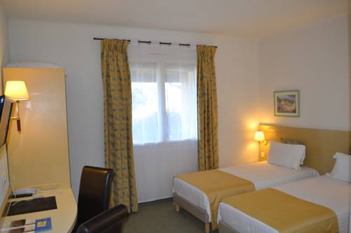 Imagen de la habitación del Hotel Saint Geniès. Foto 2