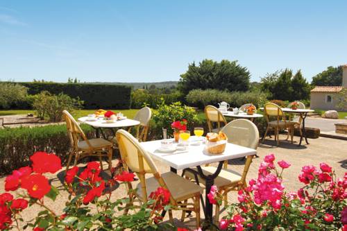 Imagen de la habitación del Hotel Saint Geniès. Foto 10