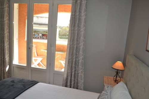 Imagen de la habitación del Hotel Saint Geniès. Foto 13