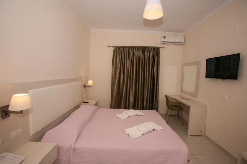 Imagen de la habitación del Hotel Saint George Palace, Agios Georgios Pagon. Foto 18