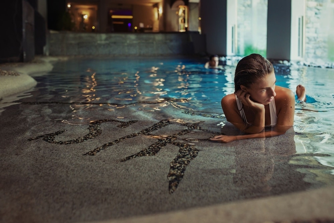 Imagen de la piscina del Hotel Saint Hubertus Resort. Foto 18