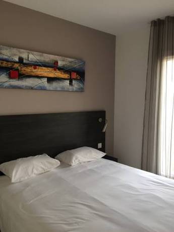Imagen de la habitación del Hotel Saint Louis, Aigues-Mortes. Foto 10