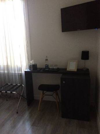 Imagen de la habitación del Hotel Saint Louis, Aigues-Mortes. Foto 14