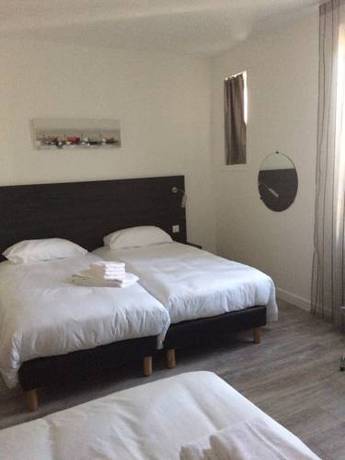 Imagen de la habitación del Hotel Saint Louis, Aigues-Mortes. Foto 15