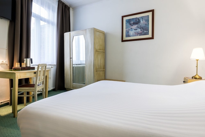 Imagen de la habitación del Hotel Saint Maurice. Foto 6