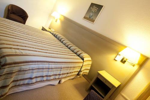 Imagen de la habitación del Hotel Saint Roch. Foto 10