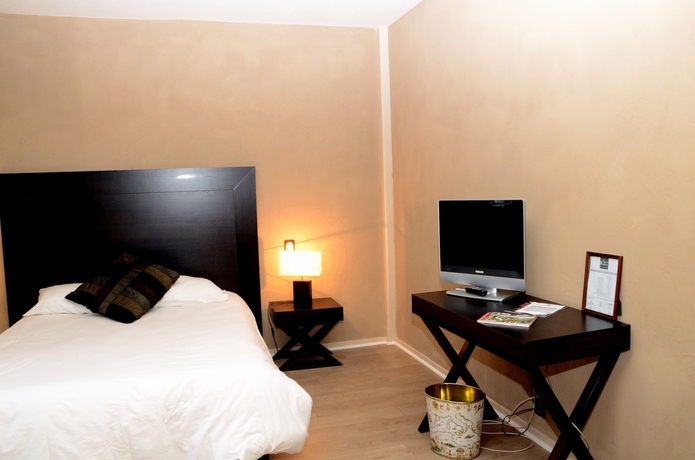 Imagen de la habitación del Hotel Saint Romain. Foto 12