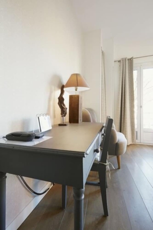 Imagen de la habitación del Hotel Saint Sernin. Foto 9