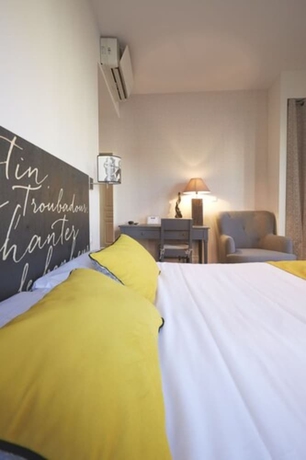 Imagen de la habitación del Hotel Saint Sernin. Foto 12