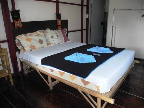 Imagen de la habitación del Hotel Saint Tropez Guest House. Foto 20