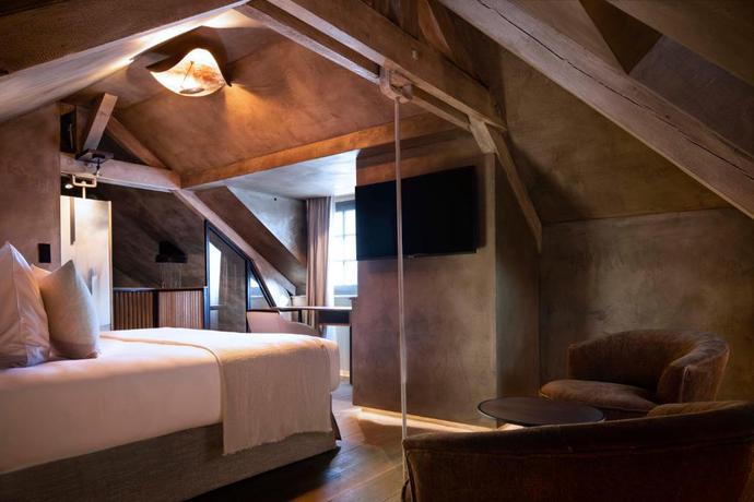 Imagen de la habitación del Hotel Saint-Delis - La Maison du Peintre - Relais and Chateaux. Foto 4
