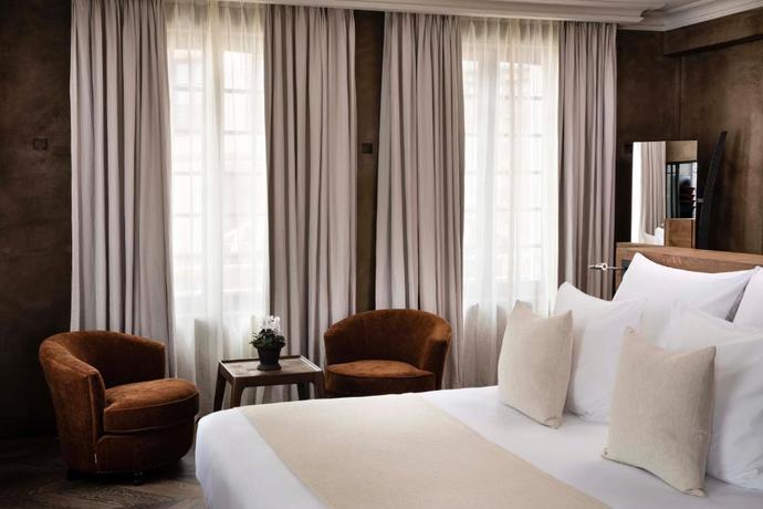 Imagen de la habitación del Hotel Saint-Delis - La Maison du Peintre - Relais and Chateaux. Foto 7