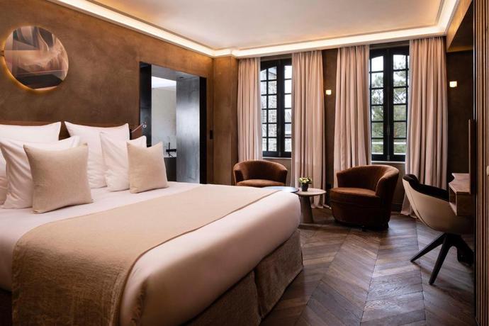 Imagen de la habitación del Hotel Saint-Delis - La Maison du Peintre - Relais and Chateaux. Foto 8