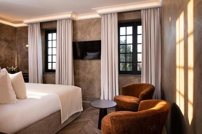 Imagen de la habitación del Hotel Saint-Delis - La Maison du Peintre - Relais and Chateaux. Foto 10