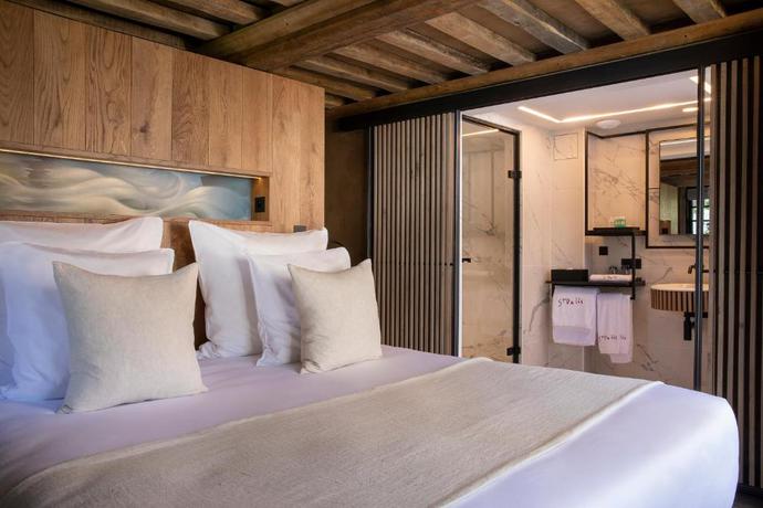 Imagen de la habitación del Hotel Saint-Delis - La Maison du Peintre - Relais and Chateaux. Foto 11