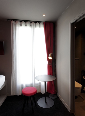 Imagen de la habitación del Hotel Saint-Marcel. Foto 9