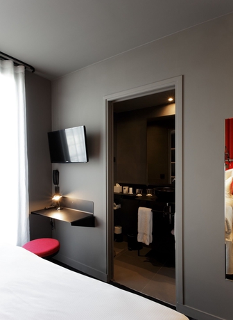 Imagen de la habitación del Hotel Saint-Marcel. Foto 11