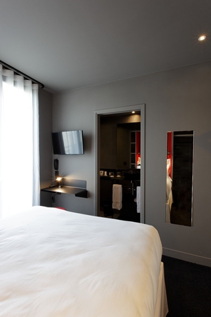 Imagen de la habitación del Hotel Saint-Marcel. Foto 15