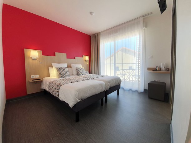 Imagen de la habitación del Hotel Saint-Raphael Le Dramont. Foto 16