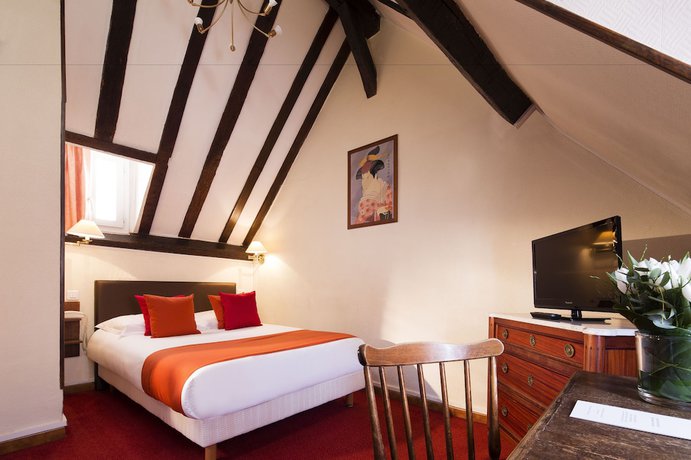 Imagen de la habitación del Hotel Saint-Roch. Foto 9