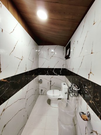 Imagen de la habitación del Hotel Saiva Hill Resort. Foto 10