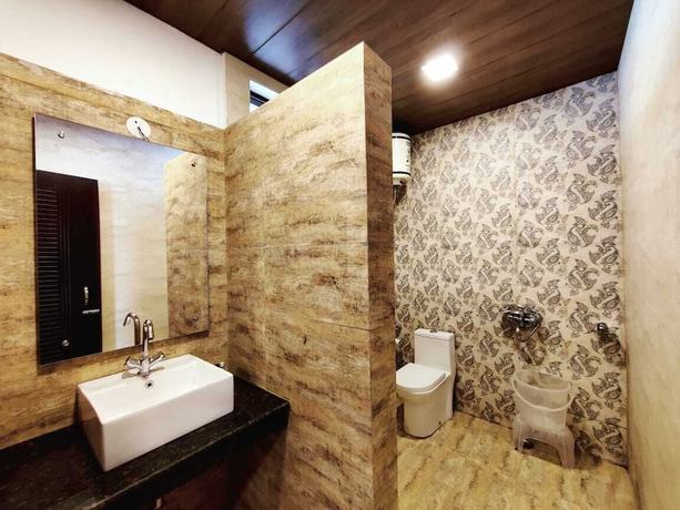 Imagen de la habitación del Hotel Saiva Hill Resort. Foto 12