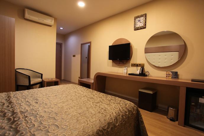 Imagen de la habitación del Hotel Sakarya Grand Hotel. Foto 13
