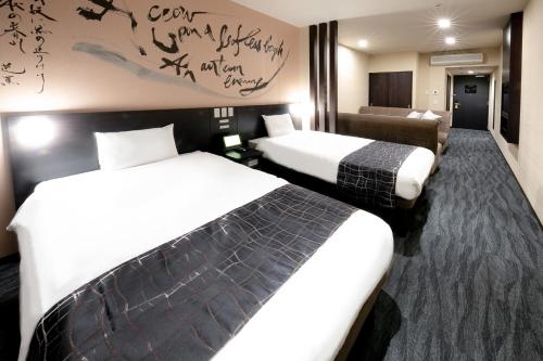 Imagen de la habitación del Hotel Sakishima Cosmo Tower. Foto 7