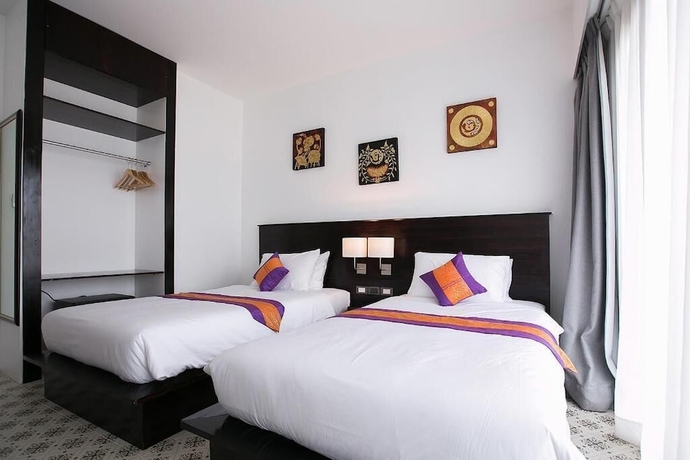 Imagen de la habitación del Hotel Saksuksmile Resort. Foto 11