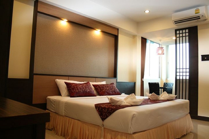 Imagen de la habitación del Hotel Sakulchai Place. Foto 2