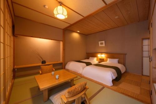 Imagen de la habitación del Hotel Sakunami Onsen Yuzukushi Salon Ichinobo. Foto 6