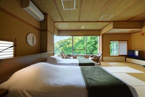 Imagen de la habitación del Hotel Sakunami Onsen Yuzukushi Salon Ichinobo. Foto 7