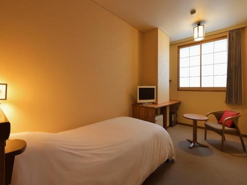 Imagen de la habitación del Hotel Sakunami Onsen Yuzukushi Salon Ichinobo. Foto 10