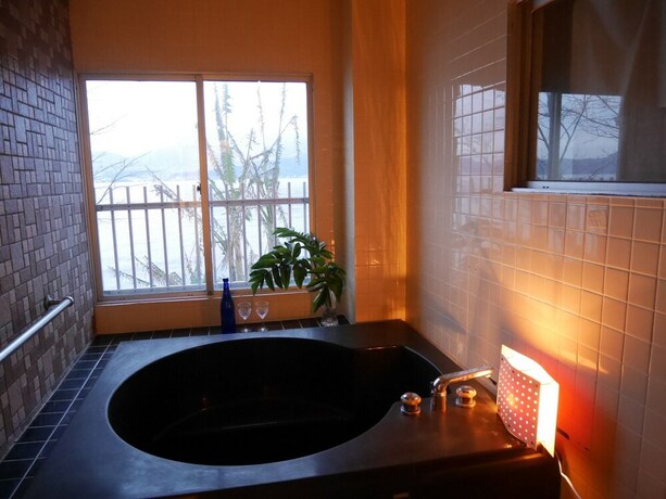 Imagen de la habitación del Hotel Sakura Beach Garden. Foto 23