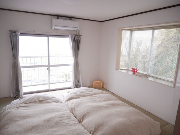 Imagen de la habitación del Hotel Sakura Beach Garden. Foto 33