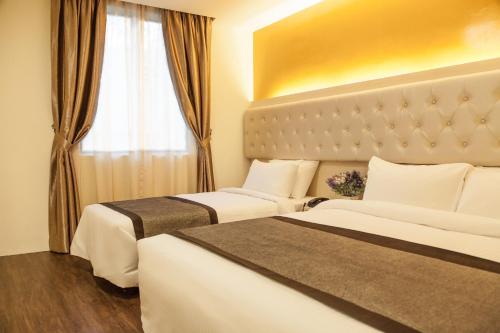 Imagen de la habitación del Hotel Sakura Elite. Foto 9